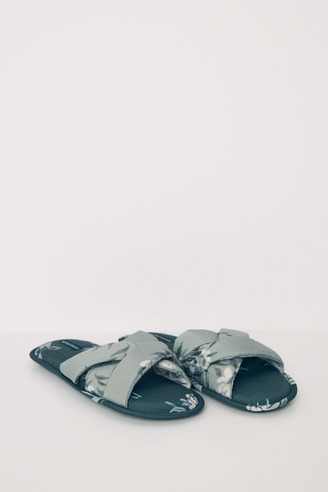 Open green house slippers - Bottle