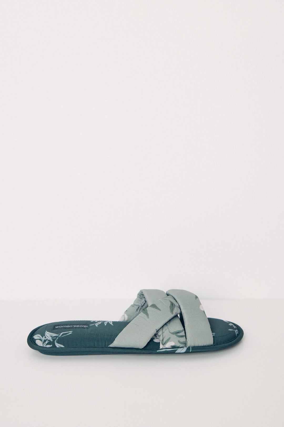 Open green house slippers - Bottle